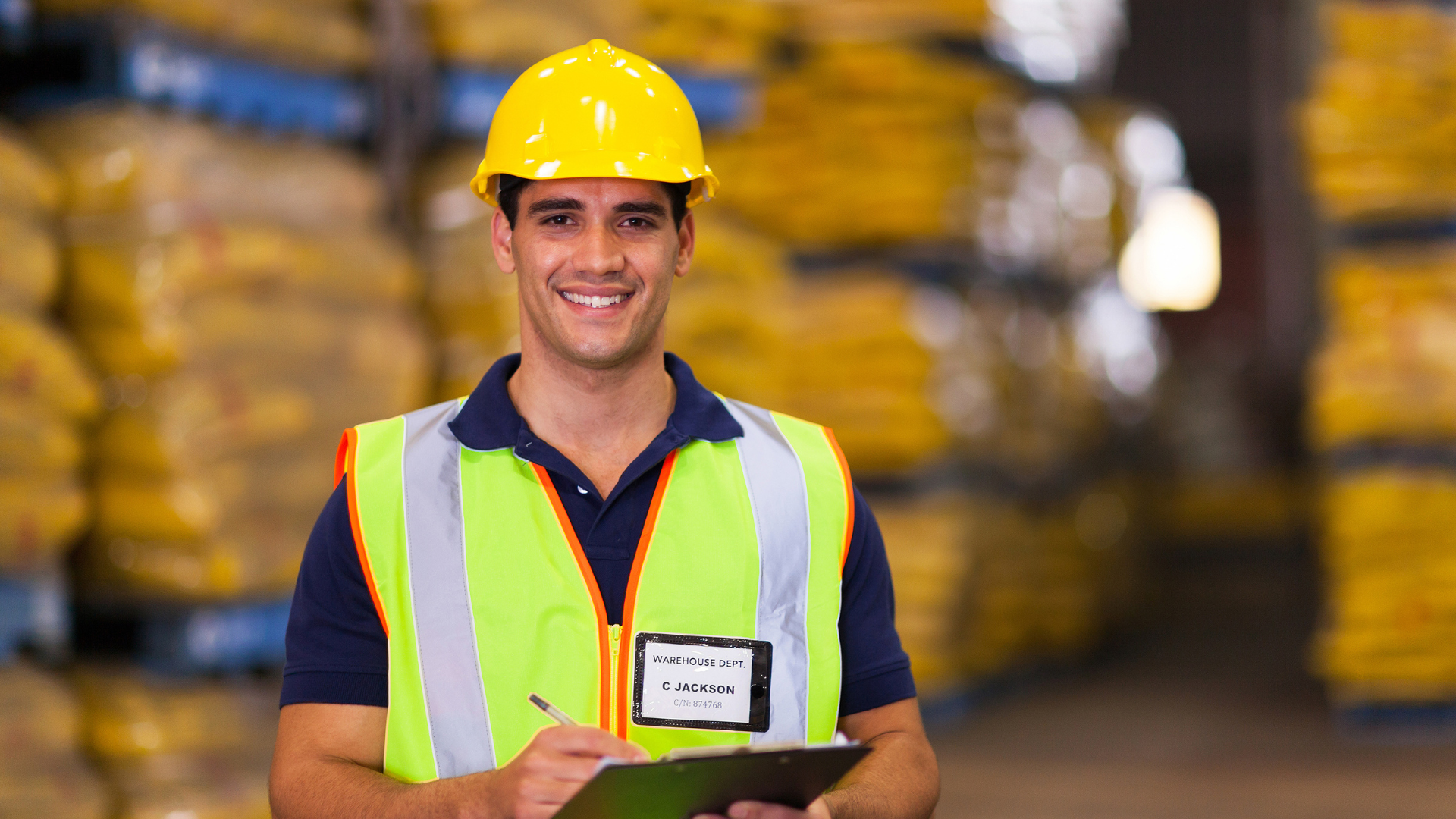 Warehouse associate representing consistent food distribution workforce management on the shift.